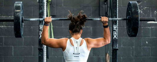 Woman lifting weights.