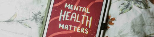 A red-colored signed with text that says "mental health matters"