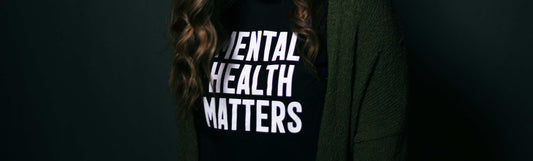 Black t-shirt with the words "Mental Health Matters"