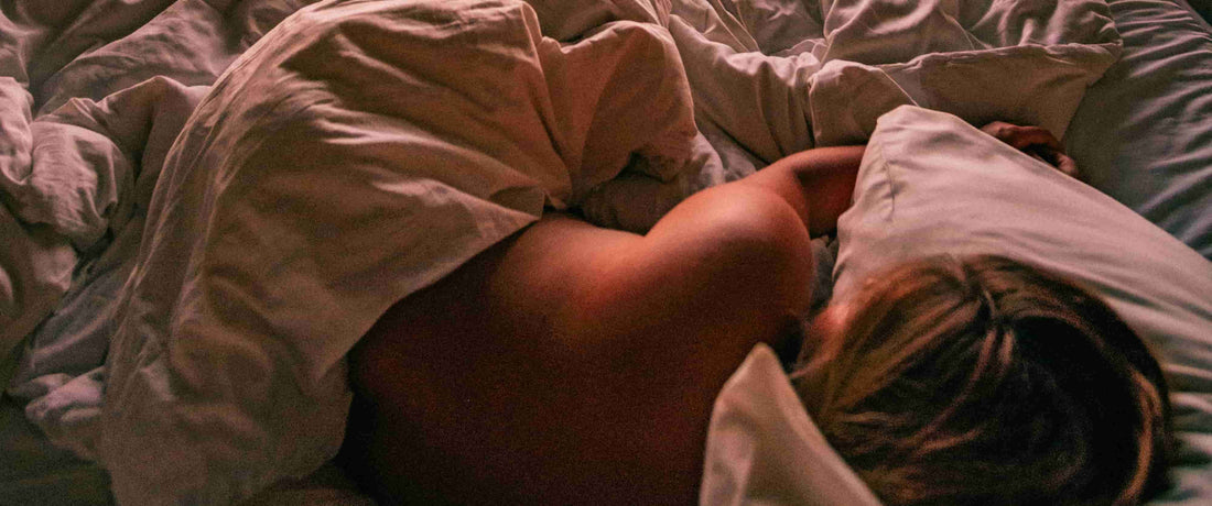 Woman sleeping answering the question "What Sleep Supplements Work For You?"